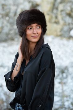 The Chapka is the must-have accessory for this winter!  Adopt a Siberian look! Made in France with care and attention to detail by hand, this chapka gives you the sumptuous look of fur without causing ecological damage. Designed with superior quality faux fur, it guarantees unparalleled softness and protection from the cold. Add a touch of elegance and warmth to your wardrobe with this unique toque made in my workshop in Templeuve, France. Each chapka is created with passion and expertise to off Faux Fur Bucket Hat, Fur Bucket Hat, Faux Fur Hat, Style Expert, Made In France, Caps Hats, Accessories Hats, Faux Fur, Winter Hats