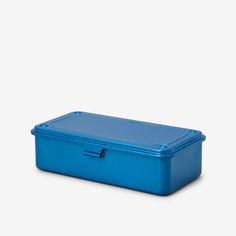 a blue plastic box with handles on the top and bottom, sitting against a white background