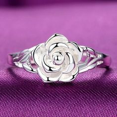 Not every rose has its thorn. Some roses are just beautifully set in a ring detail looking beautiful and polished. This sweet and rosy keepsake is the perfect gift for yourself or a loved one. It is made with premium Sterling Silver. A rose-shaped accent highlights the design. *Choose your size. Our Guarantee: If you a Silver Rose Ring, Street Shooting, Mens Rings Fashion, 3d Rose, Stylish Rings, Wedding Party Jewelry, Rose Ring, Men's Jewelry Rings, Mua Sắm