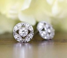 Specification:- Stone Details :- *Diamond Material : Cubic Zirconia ( CZ ) & Moissanite (As Per Order) *Center Diamond Shape : Round *Total Diamond Weight : 2.97CT (Approx) *Center Diamond Dimension : 5.50 MM (2 Pcs.) *Center Diamond Weight : 1.32CT  *Side Diamond Dimension : 3.00 MM  *Side Diamond Weight : 1.65CT  *Diamond Color: White  *Diamond Clarity : VVS *Certificate : AGL/ AGS (ONLINE) *Making Process: Handmade by our Experienced Staff. *Stamp: Our All Earring Stamped According to metal P White Gold Cubic Zirconia Diamond Earrings For Wedding, Classic Round Hand Set Diamond Earrings, Classic Sterling Silver Diamond Earrings For Wedding, Wedding Brilliant Cut Cubic Zirconia Diamond Earrings, Wedding Diamond Earrings With Brilliant Cut Cubic Zirconia, Diamond White Prong Set Diamond Earrings For Wedding, Classic Handset White Gold Diamond Earrings, Classic Hand Set Diamond Earrings, Classic Hand Set White Gold Diamond Earrings