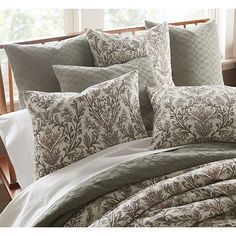 the comforter is neatly made and ready to be used in this bedding set