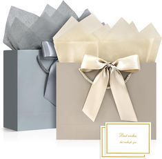 a gift bag with a bow on the front, and a card in the back