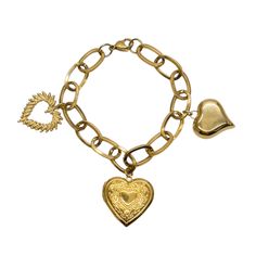 Meet your favorite charm bracelet, Lola! Handcrafted from water and tarnish resistant stainless steel elements, this gorgeous piece is 8” in length, and will clasp shorter as desired. It features three different heart charms, all varying in size and design to create an unforgettable charm piece you will treasure for years to come. Lola has a gorgeous, upscale vintage vibe to its design. Be the "it" girl with this piece, and you will always be asked, "Where did you get that bracelet?!" --8" Lengt Nickel-free Double Heart Stainless Steel Jewelry, Stainless Steel Heart Charm Jewelry, Vintage Metal Heart Charm, Vintage Metal Heart Charms, Heart-shaped Charm Bracelet With Dangling Charms For Valentine's Day, Metal Heart Charm Dangle Jewelry, Metal Dangle Jewelry With Heart Charm, Metal Heart Charm For Valentine's Day, Stainless Steel Heart Charm Bracelet