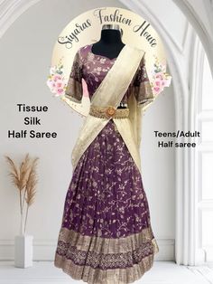 Elegant Tissue Half saree in elegant deep purple color with vibrant Dupatta with work. size :38 height:41 in Purple Silk Sharara For Navratri, Festive Purple Silk Pre-draped Saree, Purple Anarkali Set With Traditional Drape, Elegant Purple Tissue Silk Pre-draped Saree, Purple Pre-draped Saree For Wedding And Eid, Elegant Purple Pre-draped Saree, Purple Art Silk Pre-draped Saree With Self Design, Purple Tissue Silk Pre-draped Saree With Sheer Dupatta, Purple Chanderi Sharara For Navratri