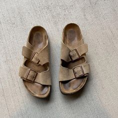 Birkenstock Arizona tan suede sandal size 38 these have some marks and wear as expected with a preowned item. zoom in on photos for details. still lots of life left! FINAL SALE Birkenstock Sandals Women, Birkenstock Women, Birkenstock Arizona, Suede Sandals, Brown Sandals, Tan Suede, Strappy Sandals, Gladiator Sandals, Women's Shoes Sandals