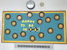 a bulletin board that says happy to be in peace with smiley faces on the front