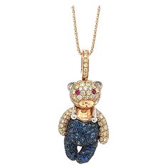 18K Gold Bear Necklace with Fancy Diamonds & Blue Sapphires 72 Blue Sapphires 1.24 CT 82 Fancy Diamonds 0.90 CT 2 Rubies 0.04 CT 18K Rose Gold 7.51 GM This stunning necklace features a charming bear pendant adorned with beautiful Blue Sapphires, making it the perfect accessory for any occasion. With its unique design, high-quality craftsmanship, and dazzling Blue Sapphires, this bear necklace is a must-have for anyone who loves luxurious and stylish jewelry. Whether you're dressing up for a spec Bear Necklace, Bear Pendant, Fancy Diamonds, Stunning Necklace, Stylish Jewelry, 18k Rose Gold, Beautiful Blue, Everyday Look, Blue Sapphire