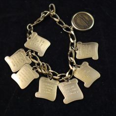 #vintage #gold #metal #10 #commandments #bracelet #charms #love #fashion #god #jewelry #jesus #holyspirit #art #accessories #style #collectibles #ebay Silver Vintage Jewelry For Friendship, Vintage Adjustable Chain Bracelet With Charms, Vintage Adjustable Charm Bracelet Collectible, Vintage Adjustable Engraved Charm Bracelet, Vintage Adjustable Charm Bracelet With Engraving, Vintage Friendship Bracelet Jewelry, Vintage Gold Bracelets For Friendship, Vintage Gold Bracelet For Friendship, Gold Vintage Friendship Bracelet