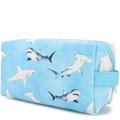 An adorable and square bag to hold all your essentials! Hold makeup, stationery, and more in this pouch and keep your bag organized! The Cosmetic Pouch Happy Sharks Blue is the perfect addition to your bag! Length: 8 inches Width: 4 inches Depth: 3 inches Weight: 0.4 lbs Material: Vegan Leather Rectangular Travel Pencil Case With Zipper, Rectangular Zipper Pouch Cosmetic Bag For Daily Use, Rectangular Zipper Pouch For Everyday Cosmetic Storage, Rectangular Zipper Pouch For Everyday Use, Blue Rectangular Cosmetic And Toiletry Storage As Gift, Daily Use Portable Rectangular Cosmetic Storage, Trendy Rectangular Stationery For Everyday Use, Blue Zipper Pouch For Daily Use, Cute Rectangular Cosmetic Bag For Travel