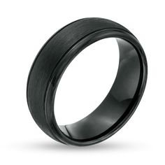 black ceramic wedding ring with satin finish inlayed to the center, on an isolated white background