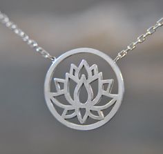 Fantastic and spiritual... This lotus necklace is part of our new spring collection. It is made of 925 sterling silver and has a simple lotus flower motif, which will be the perfect addition to your outfit. The lotus flower is the symbol of purity of heart, creativity, faithfulness and enlightenment. Love and life are also among the long list of meanings ascribed to this majestic flower. To give a precious feeling to your mother, girlfriend or yourself, this necklace would be the perfect gift choice. Be it as a Christmas gift, birthday gift, Mother's Day gift or even bridal jewelry. It is also available in a set with a bracelet, earrings and ring, making them the perfect gift idea for your loved ones. You can find the products under the following links: https://www.etsy.com/de/listing/1200 Adjustable Hypoallergenic Sterling Silver Necklace, Symbolic Sterling Silver Charm Necklaces For Mother's Day, Spiritual Sterling Silver Nickel Free Charm Necklace, Adjustable Sterling Silver Necklace As Gift For Mom, Spiritual Silver Jewelry Gift For Mom, Mother's Day Symbolic Sterling Silver Charm Necklaces, Sterling Silver Flower Jewelry For Everyday, Delicate Adjustable Sterling Silver Charm Necklaces, Spiritual Sterling Silver Hypoallergenic Necklace