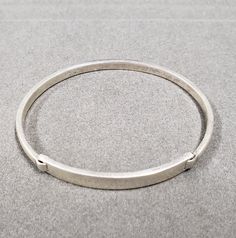 -PRODUCT TYPE - 925 Sterling Silver Bangle -MATERIAL - Silver -PURITY - 925 -TOTAL WEIGHT - 15.830 GRAMS - BANGLE WIDTH - 4 MM - BANGLE INSIDE DIAMETER - 61 MM We are proud to launch this dainty and minimalist thick bangle made with 925 silver on Etsy. This item is 100% handmade from start to finish. -Quality is guaranteed. Our mission is always to satisfy our customers with our offerings, so just relax and place order! -For Express shipping it is advised that if you order in bulk, you will get Minimalist Sterling Silver Oval Bracelets, Classic Adjustable Hoop Bracelets, Minimalist Sterling Silver Oval Bracelet, Minimalist Oval Sterling Silver Bracelets, Minimalist Oval Sterling Silver Bracelet, Adjustable Bangle With Sterling Silver Clasp, Adjustable Round Cuff Bracelet With Sterling Silver Clasp, Adjustable Cuff Bracelet With Sterling Silver Clasp, Adjustable Oval Engraved Bracelets