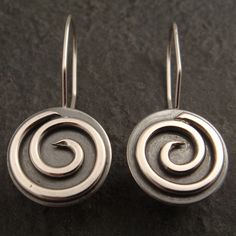 Flat Sterling Spiral Earrings by DownToTheWireDesigns on Etsy Nickel Free Spiral Earrings For Everyday, Spiral Pierced Earrings As Gift, Spiral Pierced Earrings For Gift, Handmade Spiral Earrings For Everyday Wear, Spiral Sterling Silver Earrings As Gift, Unique Spiral Earrings For Gift, Minimalist Swirl Earrings As Gift, Everyday Spiral Earrings For Pierced Ears, Handmade Swirl Earrings As Gift