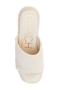 A woven finish adds abundant texture to an arch-supporting sandal set on a retro-chic platform sole. 4 1/4" heel; 2 1/2" platform Contoured footbed with arch support Synthetic upper, lining and sole Imported Synthetic Platform Slippers For Beach, Trendy Non-slip Platform Slippers For The Beach, Beach Slip-on Synthetic Platform Slippers, Spring Beach Platform Slippers, Synthetic, Non-slip Open Toe Platform Slippers For Beach, On Beach, Sandal Women, Retro Chic, Arch Support