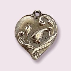 This is a very romantic vintage inspired heart pendant.  I have a love for vintage things (especially jewelry), so when I saw several molds made from vintage heart pendants, I had to have them.   This works great as a pendant on a chain or as a charm on a bracelet. Since this item is made to order, please allow 2 weeks for it to be created and shipped out to you.  If you need this quicker, please convo me!  Initials can be placed on the back of the pendant.  Since this is handcrafted, no two wil Vintage Heart Charm Necklace For Valentine's Day, Vintage Necklace For Valentine's Day, Heart-shaped Vintage Charm Necklace For Anniversary, Heart Shaped Vintage Charm Necklace For Anniversary, Vintage Double Heart Charm Necklaces, Vintage Heart Necklace With Vintage Charm For Anniversary, Vintage Double Heart Engraved Necklace, Vintage Heart Necklace With Charm For Anniversary, Vintage Charm Heart Necklace For Anniversary