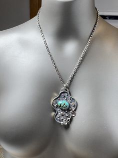 "ARTISAN ROYSTON TURQUOISE PENDANT comes with 20\" chain Hand-made Sterling Silver 925. Stones used: Royston Turquoise, Green Tourmaline, Sapphire, Amethyst. Height -2 1/2\" (with bail), Width - 1 3/4\" Height - 62mm, width-45mm. Unique Handcrafted One-of a-kind Design Pendant. Each Piece of Jewelry in my Collection is Absolutely One of a Kind! When you start wearing a piece of my jewelry you will fall in love with it more and more each day and feel that good Energy and Love that I pass into it Turquoise Chrysocolla Necklace With Large Pendant, Elegant Handmade Turquoise Chrysocolla Necklace, Unique Green Flower Pendant Jewelry, Fusion Style Turquoise Sterling Silver Jewelry, Oxidized Rectangular Pendant Necklace, Green Oxidized Pendant Necklace, Spiritual Nickel-free Turquoise Pendant Necklace, Unique Oxidized Necklace With Rectangular Pendant, Unique Necklace With Oxidized Rectangular Pendant