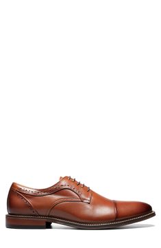 Broguing and burnished details accent a round cap toe lace-up that features anatomical arch support. Round cap toe Broguing details Lace-up Arch support removable insole Leather upper, manmade sole Imported Classic Fitted Plain Toe Lace-up Shoes, Classic Plain Toe Lace-up Shoes, Fitted Dress Shoes With Leather Footbed For Derby, Classic Fitted Lace-up Shoes With Plain Toe, Fitted Derby Shoes With Brogue Detailing And Plain Toe, Fitted Derby Shoes With Brogue Detailing, Fitted Leather Footbed Oxfords With Plain Toe, Fitted Plain Toe Oxfords With Leather Footbed, Fitted Dress Shoes With Removable Insole For Derby