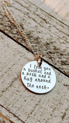 "Please leave a phone number in the checkout notes in case I need to call or text to get more information. Thanks. PLEASE READ SHOP ANNOUNCEMENT AND POLICIES. Hand stamped on sterling silver with a sterling silver chain. \"I love you a bushel and a peck and a hug around the neck.\" All of our items are hand stamped by me and not a machine, so spacing and alignment may be imperfect, which can add to the charm and character of hand stamped jewelry. Because of the uniqueness of the craft, the lette Meaningful Hand Stamped Jewelry For Birthday Gift, Meaningful Hand Stamped Charm Necklace For Mother's Day, Meaningful Hand Stamped Charm Necklaces For Mother's Day, Meaningful Stamped Charm Necklaces For Mother's Day, Personalized Hand Stamped Charm Necklaces, Inspirational Hand Stamped Jewelry For Best Friend, Hand Stamped Meaningful Necklaces For Valentine's Day, Meaningful Hand Stamped Necklaces For Valentine's Day, Meaningful Hand Stamped Charm Necklace Gift