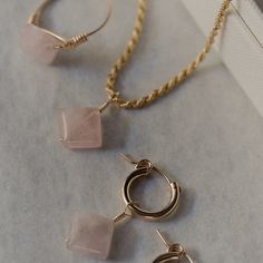 Normally a $212 value, get this square cut rose quartz set for a discounted bundle price of $155! Featuring all large square cut rose quarts gems, this jewelry set includes a simple ring, rope chain pendant necklace, and mini hoop huggie earrings only available in all high quality 14k gold filled material. Rose quartz is the ultimate gemstone of love. This crystal means more love is coming your way and the more love you receive the more you have to give :) Simple Ring, Huggie Earrings, Square Cut, Rings Simple, Chain Pendant, Necklace Sizes, Rope Chain, Huggies Earrings, Chain Pendants