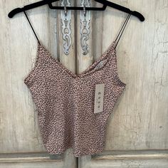 New, Gaze Dtla Camisole Top Super Soft; Stretchy Material Nude And Black Cheetah Pattern; Black Elastic Straps Size: Small Underside Self-Lined In Bust Area Brunch Camisole With Built-in Bra, Sleeveless Tank Top With Built-in Bra For Brunch, Chic Tank Strap Tops For Loungewear, Beige Cami Top For Loungewear, Chic Loungewear Tops With Tank Straps, Beige Cami Top For Night Out, Fitted Camisole Tank Top For Brunch, Sleeveless Camisole With Built-in Bra For Brunch, Fitted Camisole Crop Top For Brunch