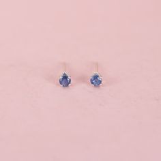 These tiny blue sapphire stud earrings are just perfect for a tiny bit of sparkle or for second piercings.  They feature recycled sterling silver posts and 2.5 mm genuine sapphire gemstones.  The post is centered on the back of the setting.  Reliable and effortless - exactly the kind of sparkle that I love to add to my day. Sapphire is the birthstone of September.  Made from responsible and recycled silver. Gemstone studs: https://www.etsy.com/shop/LotusStone?ref=seller-platform-mcnav&search_query=gemstone+studs Birthstone studs: https://www.etsy.com/shop/LotusStone?ref=seller-platform-mcnav&search_query=birthstone+studs Second piercing: https://www.etsy.com/shop/LotusStone?ref=seller-platform-mcnav&search_query=second+piercing Hoops to Pair: https://www.etsy.com/shop/LotusStone?ref=seller Small Sapphire Earrings, Second Piercings, Blue Sapphire Earrings, Earrings Sapphire, Sapphire Stud Earrings, Blue Sapphire Studs, Second Piercing, Blue Stud Earrings, Sapphire Earrings Studs