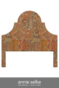 an ornate headboard made out of old rugs and fabrics with the words annie selke on it