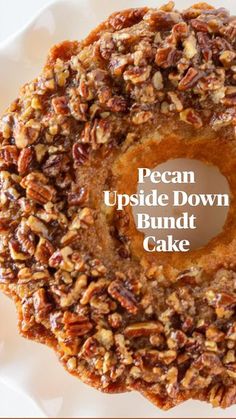 pecan upside down bundt cake on a white plate with the words, pecan upside down bundt cake