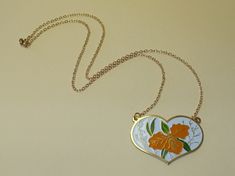 "Lovely vintage 80's floral painted heart necklaces. Heart measures 1 1/4\" X 1 3/4\" on 18\" chain. Please check out all of our great vintage deadstock jewelry and accessories in our ETSY store SHOPHULLABALOO. Thanks!! The Hullabaloozers" Retro Enamel Necklaces For Gift, Retro Heart-shaped Necklace Gift, Retro Heart-shaped Necklace For Gift, Vintage Heart Enamel Necklaces, Vintage Heart Enamel Necklace, Vintage Enamel Heart Necklaces, Vintage Enamel Heart Necklace, Necklaces Heart, Heart Necklaces