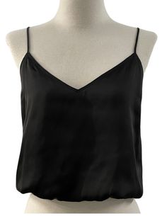 Description Introducing the Amore Love Tank - the must-have tank top for any fashion-forward individual. With its V-neck design and adjustable straps, this bubble tank top offers a versatile and comfortable fit, while the extended length provides coverage and a sleek silhouette. Made with soft, satin material and offering a variety of colors, this tank is perfect for any occasion and a must-have in your closet. Product Details and Fit - V neck- Bubble tank top - Adjustable straps - Regular/loose Chic Tank Vest With Built-in Bra, V-neck Camisole With Delicate Straps For Night Out, V-neck Top With Adjustable Straps For Night Out, Trendy V-neck Top With Adjustable Straps, Chic Tops With Built-in Bra And Wide Straps, Trendy Camisole With Built-in Bra And Wide Straps, Chic V-neck Tank Top With Adjustable Straps, Black V-neck Top With Delicate Straps, Date Night Tank Top With Built-in Bra