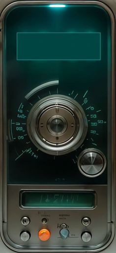 an old radio with buttons and dials on the display screen is seen in this image