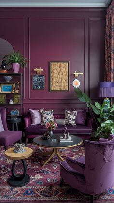 a living room with purple walls and furniture