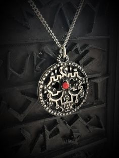 This Seal of Belial necklace is an handmade pewter sculpture with a gem of your choice (my favorite is the red abalone) This seal of Belial is one of the 72 Sigils of Goetia This Sigil of Goetia pendant is sold with a free 18'' stainless steel chain, if you would like to have a different length for the chain, you can write the desired length in the private note section when ordering :) This Seal of Belial is a pendant of 3cm diameter This Sigil of Belial is a pewter sculpture of my own creation, Symbolic Round Necklace With Intricate Design, Symbolic Hand Forged Necklaces, Ornate Antique Finish Metal Jewelry, Round Pewter Jewelry As Gift, Round Pewter Jewelry Gift, Oxidized Metal Medallion Jewelry, Silver Medallion Metal Necklace As Gift, Ceremonial Antique Silver Oxidized Jewelry, Silver Medallion Metal Necklace For Gift