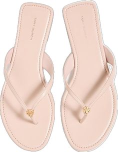 Feminine Flat Leather Sandals, Elegant Beige Sandals With Leather Footbed, Classic Calf Leather Flat Sandals, Elegant Slip-on Sandals With Rubber Sole, Classic Pink Open Toe Sandals, Classic Tan Leather Sandals, Classic Leather Sandals With Flat Heel, Elegant Leather Slip-on Sandals, Classic Tan Sandals With Leather Sole