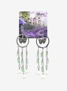 Something mystical is fluttering into your jewelry collection! These drop earrings feature a butterfly pendant at the center with drop charms of leaves and flowers.3 34" dropsNickel-free alloy; acrylicImported Summer Metal Dangle Flower Earrings, Summer Dangle Flower Earrings, Spring Dangle Metal Jewelry, Flower Drop Earrings, Tall Hoodies, Butterfly Flower, Butterfly Flowers, Butterfly Pendant, Accessories Jewelry Earrings