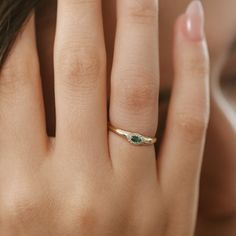 "Emerald Ring / 14k Solid Gold with Marquise Emerald Ring in Halo Setting with Round Pave Diamonds by Ferkos Fine Jewelry / May Birthstone Item Details  * Made to Order * Gold Kt: 14K (also available in 18K) * Available Gold Color: Rose Gold, Yellow Gold, White Gold * Round Diamond: 12 pcs 1.0 MM * Marquise Emerald: 1 pc 4 X 2 MM * Diamond Carat Weight: 0.07 ctw * Emerald Carat Weight: 0.10 ctw * Diamond Color-Clarity: G Color SI Clarity If you have any additional questions about this ring, just hit the \"Message Ferko\" button and we will get back to you within a few hours. ▶ See more of our Emerald Jewelry - https://etsy.me/3QCyZBQ ▶ See our storefront here - http://etsy.me/2lUcVnH  ▶ All store sections here * Diamond Rings - http://etsy.me/2lwKUl8 * Diamond Earrings - http://etsy.me/2ly 14k Gold Jewelry With Gemstone Accents For May Birthstone, 14k Gold Emerald Promise Ring, May Birthstone, 14k Gold Emerald Ring For Promise, May Birthstone, Diamond Multi-stone Jewelry For May Birthstone, Dainty Emerald Jewelry For Promise, Green 14k Gold Ring With Accent Stones, 14k Gold Green Rings With Accent Stones, Green 14k Gold Promise Birthstone Ring, Green 14k Gold Rings With Accent Stones