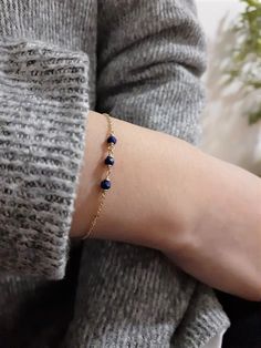 This beautiful handmade bracelet features 3 Genuine Lapis Lazuli gemstones wrapped in the metal of your choice. Dainty, minimal, and elegant, this bracelet is the perfect finishing touch to any style or event. Makes a great gift to add to any gemstone lover's collection. Perfect to gift for Christmas, Valentine's Day, Mother's Day, and more! Gemstone: Lapis Lazuli Gemstone Size: 3.0 mm Gemstone Shape: Rondelle, Faceted Metal: 14k Gold Filled or Sterling Silver (Nickel Free) Bracelet Length: The Bracelet Size Chart, Lapis Lazuli Bracelet, Gold Necklace Simple, Free Bracelet, Moonstone Necklace, Dainty Bracelets, Gold Bracelet Chain, December Birthstone, Gift For Christmas