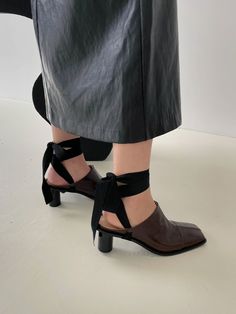 Editor's NoteOI PAINTED's shoe will add elegance to your daily outlook- Modern chic square toe - Soft and subtle gloss leather texture- Set on a stacked heel- Manish mood and unique silhouette- Daily point itemMeasurements (in.)- Heel: 2.5in.- Size: US 5.5(KR225mm) - US 8 (KR250mm)- This item is based on the KR shoe size. Please refer to the size chart.Composition & Care- Upper: Sheepskin- Lining: Synthetic leather- Outsole: Rubber- Professional leather care onlyDesigner- by OI PAINTED Sleek Leather Block Heels With Wrapped Heel, Chic Square Toe Heels With Wrapped Heel, Chic Block Heels With Leather Sole And Square Toe, Brown Block Heels With Square Toe And Stacked Heel, Square Toe Heels With Heel Strap For Fall, Fall Heels With Heel Strap And Square Toe, Modern Brown Block Heels With Sculpted Heel, Leather Block Heels With Wrapped Heel And Almond Toe, Square Toe Patent Leather Block Heels With Heel Strap