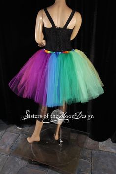 "Perfect tutu for Pride! Can also be used for carnivals, weddings, costumes, clowns, or anything rainbow themed! This knee length rainbow adult tutu is handmade from 25yards, two layers of hand cut panels in soft smooth red, orange, yellow, mint, green, turquoise, purple, fuchsia and hot pink Bridal tulle. All panels have been tightly machine gathered, doubled, serged and sewn to the soft rainbow fabric covered elastic waistband. This tutu is fully sewn not tied! It is machine washable and dryer Rainbow Fabric, Rainbow Tutu, Tulle Tutu Skirt, Skirt Knee Length, Pink Bridal, Cute Halloween Costumes, Rave Wear, Dance Costume, Halloween Cosplay