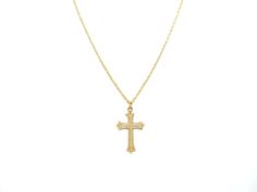 "Our diamond cut gold cross pendant necklace is meticulously handcrafted with authentic 14K yellow gold. This religious pendant necklace features an intricate floral design that's perfectly matched with a polished and durable solid 14K gold rope chain. CROSS PENDANT NECKLACE * Minimal gold cross for everyday wear * Unique diamond cut surface * Handmade with real 14K Yellow Gold NECKLACE DETAILS * Pendant Size: 26 mm x 18 mm * Pendant and Chain Material: 14K Yellow Gold * Chain Type: Rope * Chain Yellow Gold Cross Necklaces For Baptism, Gold Pendant Cross Necklace With Diamond Cut, Yellow Gold Cross Pendant For First Communion, Gold Diamond Cut Cross Pendant Necklace, Yellow Gold Cross Pendant For Baptism, Yellow Gold Cross Pendant Necklace For First Communion, Yellow Gold Diamond Cut Cross Pendant Necklace, Yellow Gold Baptism Cross Pendant Jewelry, Yellow Gold Cross Charms For Baptism