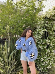 IG : @heyays Material: The sweater is knitted using 100% merino wool. The flowers on it are 100% premium acrylic. Model wears S/M. (168 cm 54 kg) Caring Tips -Please do not wash in the washing machine. We recommend professional dry cleaners or hand washing. You can also do spot stain cleaning with the help of a wet cloth. -Store your Heyays knitwears by folding them instead of hanging them. -When purchasing your knitwear piece, please take into consideration that pilling may occur when worn. Due Oversized Knitwear, Handmade Bouquet, Chunky Baby, Chunky Babies, Handmade Bouquets, Sweater Chunky, Cloth Store, Dry Cleaners, Chunky Knitwear