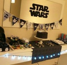 a star wars themed party with cake and decorations