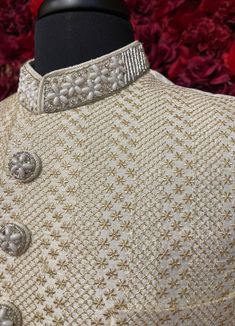 The Darpan Sherwani exudes sophistication with its elegant ivory tone and intricate textured pattern. This timeless sherwani is a perfect choice for weddings and formal celebrations, offering a regal look with unmatched craftsmanship. Key Features: Elegant Design: Ivory sherwani with detailed textured patterns. Premium Fabric: Crafted with high-quality materials for comfort and style. Customizable Accessories: Dupatta, mojari, safa, and jewelry can be tailored to your preference. Color - Ivory W Ivory Sherwani, Buy Lehenga Online, Indian Bridal Couture, Elegant Veils, Reception Gowns, Lehenga Red, Mehendi Outfits, Bridal Lehenga Red, Lehenga Online