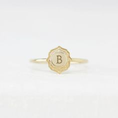 Introducing the 'Lettering Sonnet' from the Impasto Collection, a 14K yellow gold vintage signet ring that blends timeless elegance with personalized charm. This size 6 ring offers the unique opportunity to customize with your choice of lettering, making each piece as individual as the wearer's own story. Personalized 14k Gold Heirloom Initial Ring, Vintage 14k Stamped Initial Ring As Gift, Antique 14k Gold Initial Ring As Gift, Antique 14k Gold Initial Ring, Antique Style 14k Gold Initial Ring As Gift, Personalized White Gold Initial Ring In Heirloom Style, Vintage Yellow Gold Engraved Initial Ring, Timeless Engraved 14k Gold Initial Ring, Vintage 14k Gold Initial Ring Stamped 14k