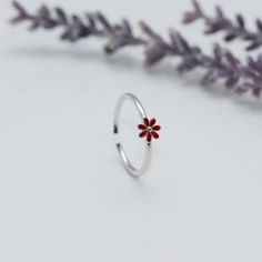 Adjustable ring with delicate red flower design, made of 925 Sterling silver in a minimalist style, ideal gift for girl, teenager or woman. Material: 100% 925 Sterling Silver. Weight: 1.00 grams. Measure:  Adjustable US 6-7 Band width: 1mm.  All orders will be shipped out within 1 business days after the order has been received. UNITED STATES - USPS First Class Mail or Priority mail. * 2 - 4 Business Days * Includes Tracking. International orders, USPS International First Class * 14 days * Inclu Red Open Flower Ring, Red Jewelry For Spring Gift, Red Jewelry Spring Gift, Red Sterling Silver Flower Ring As Gift, Red Flower Shaped Rings As Gift, Red Flower Shaped Rings For Gifts, Red Flower-shaped Rings As Gifts, Red Flower-shaped Promise Ring, Red Flower Ring For Wedding