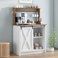 a white coffee bar with open doors and shelves