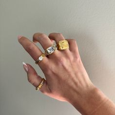 Chunky gold ring - This three stoned ring is a sparkly stunning piece shining from all sides. The perfect gold ring to add to your collection. This gold ring has a vintage vibe and makes for a great gift for moms, best friends, and anyone you love. - gold filled - stainless steel and gold - cz stone - Style: Minimalist WHY VASI Jewelry? - Ethically sourced gems and stones - Made with recycled gold - Handmade or designed/sourced - Shop local (based in Chicago) - Beats major competitors prices  - Long lasting quality - Modern and trendy - Dainty minimal pieces - Free shipping over $35 - Good reviews (checkout vasijewelry.com) VASI: follow along on instagram @vasi.jewelry or shop the site http://vasijewelry.com Care - protect your jewelry from things that could scratch the surface - keep away Timeless Gold Stackable Initial Ring, Timeless Diamond Rings Tarnish Resistant, Everyday Diamond Open Ring Jewelry, Everyday Gold Plated Open Signet Ring, Silver Gold-plated Dome Ring For Anniversary, Gold Stackable Diamond Crystal Ring, Gold Diamond Stackable Crystal Ring, Stackable Gold Crystal Ring With Diamonds, Elegant Gold Stackable Initial Ring