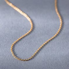 Introducing the Radiance 14kt, 18kt Gold Chain, a stunning piece of jewelry designed for elegance and versatility. This gold necklace is perfect for adding a touch of luxury to your everyday outfits or for special occasions. The Radiance Gold Chain is not just a piece of jewelry; it's a statement of elegance and sophistication. Whether you are looking for a gift for a loved one or a special treat for yourself, this gold necklace is the perfect choice. Its minimalist design ensures that it can be Statement Jewelry Outfit, Gold Statement Jewelry, Necklace For Everyday, Yellow Rose, Elegant Gift, Statement Jewelry, Everyday Outfits, Gold Chain, Chains Necklace