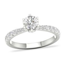 a diamond engagement ring on a white background