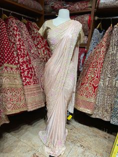 Pastel pink crepe saree with beads work and hand embroidery in multi sequence concept floral design with unstitched blouse. Fabric: Crepe Silk Ready to Ship ! Traditional Embellished Raw Silk Saree, Pink Raw Silk Saree With Dori Work, Pink Raw Silk Saree With Resham Embroidery, Unstitched Bollywood Saree With Handwork, Bollywood Style Unstitched Saree With Handwork, Anarkali Saree With Handwork For Party, Embellished Pink Silk Traditional Wear, Festive Pink Traditional Wear With Handwork, Pink Dola Silk Traditional Wear With Handwork