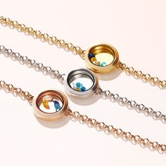 If you're looking for the perfect personalized gift, this customized floating locket is sure to please. Start by engraving on heart charm and disc inside, along with up to six colored stones to represent birthday or some of life's most meaningful milestones, made with gorgeous three tones plating over stainless steel,this engraved floating locket is a special gift for any special occasion. Jewelry makes a great gift - surprise your loved ones with this bracelet any time of the year.Carat Weight: Stainless Steel Round Pendant Jewelry For Best Friend, Round Locket Jewelry For Personalized Gift, Adjustable Stainless Steel Keepsake Jewelry, Medallion Jewelry With Rotating Bezel For Gifts, Personalized Stainless Steel Jewelry For Best Friend Gift, Round Disc Stainless Steel Jewelry Gift, Customizable Stainless Steel Jewelry For Best Friend, Rotating Bezel Round Pendant Jewelry As A Gift, Personalized Round Stainless Steel Jewelry